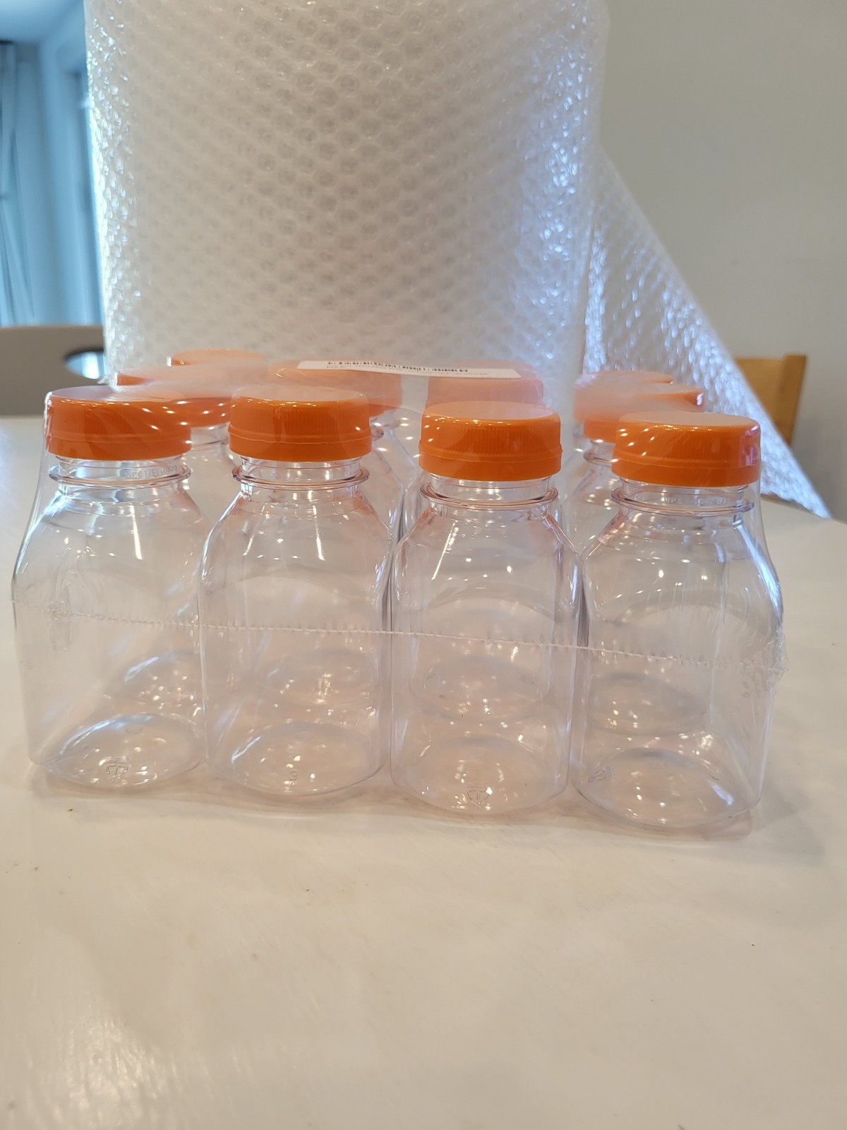 12 Pack Clear Plastic Juice Bottles w/ Orange Caps Food Grade Drink Containers
