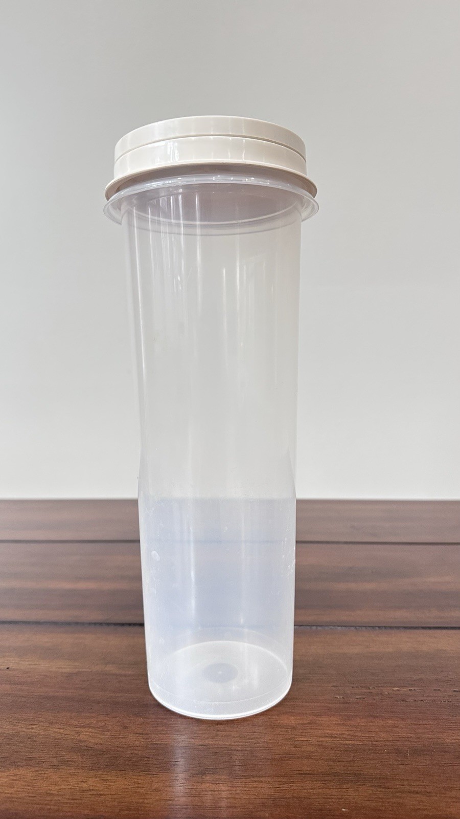 Rubbermaid Clear Plastic Cylinder Food Dispenser with almond color Snap Lid