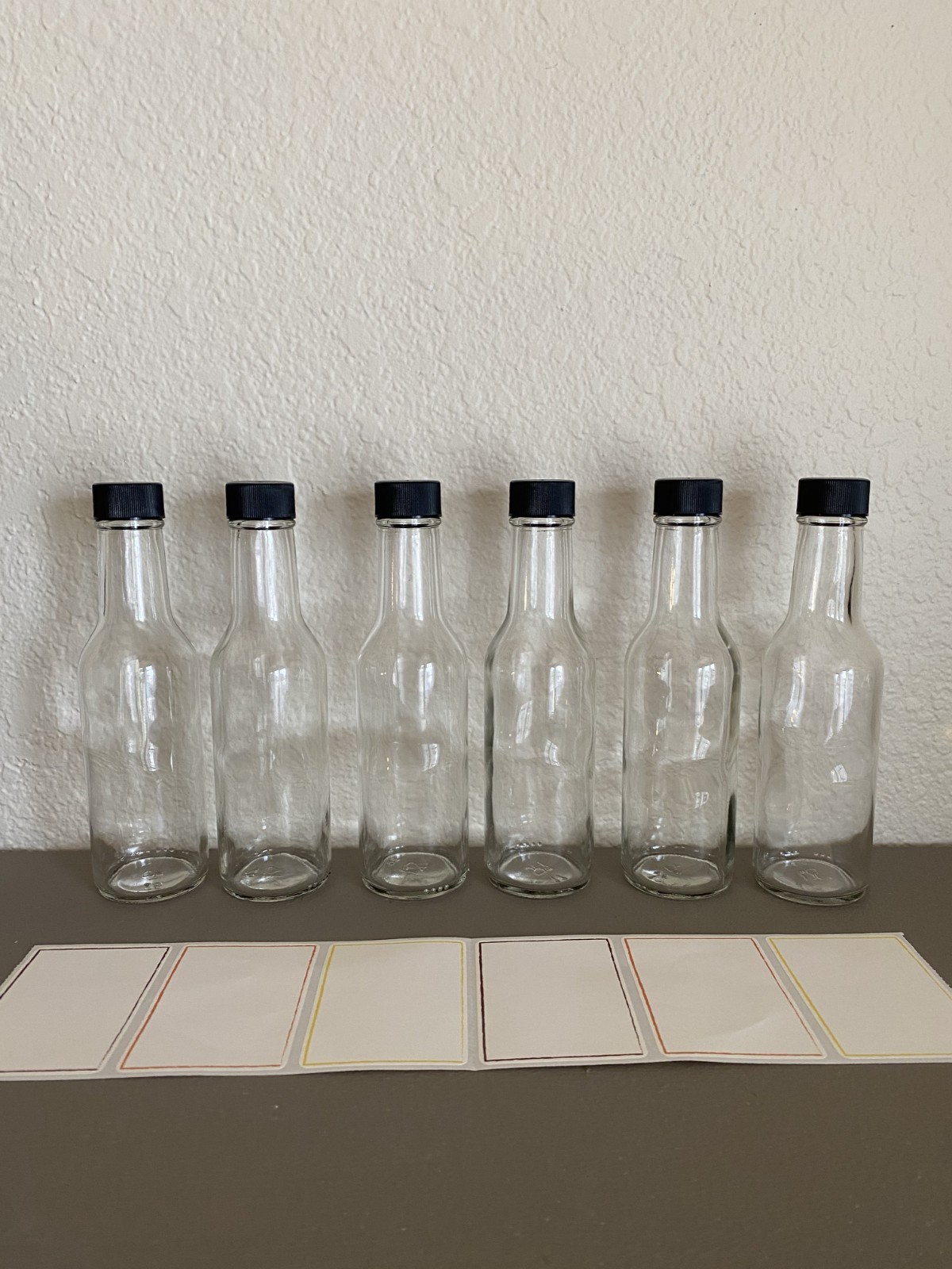 Woozy Bottles Clear with Black Screw Top Lids Set of 6 with Labels Food Safe