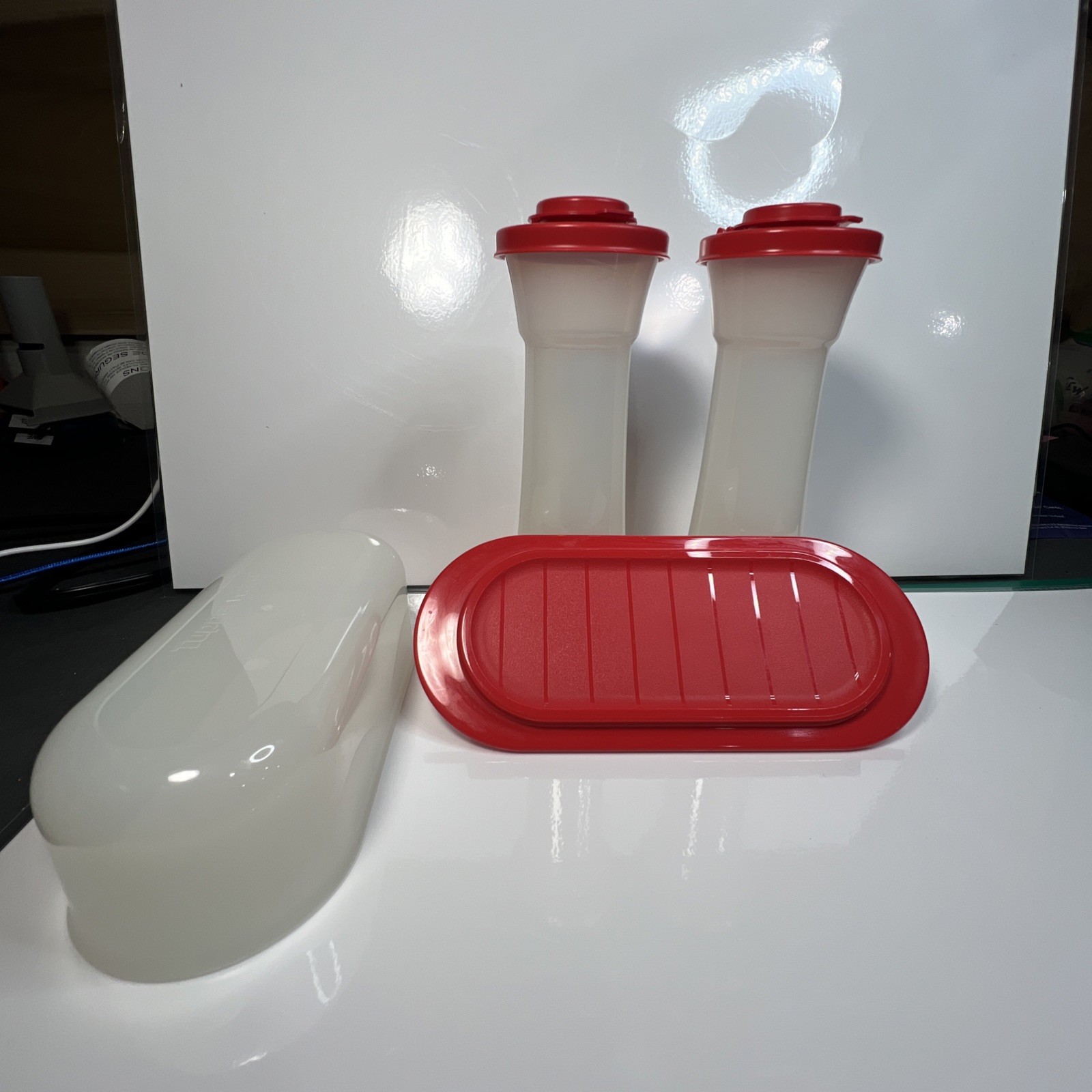TUPPERWARE salt and pepper shakers & butter dish Red Frosted White