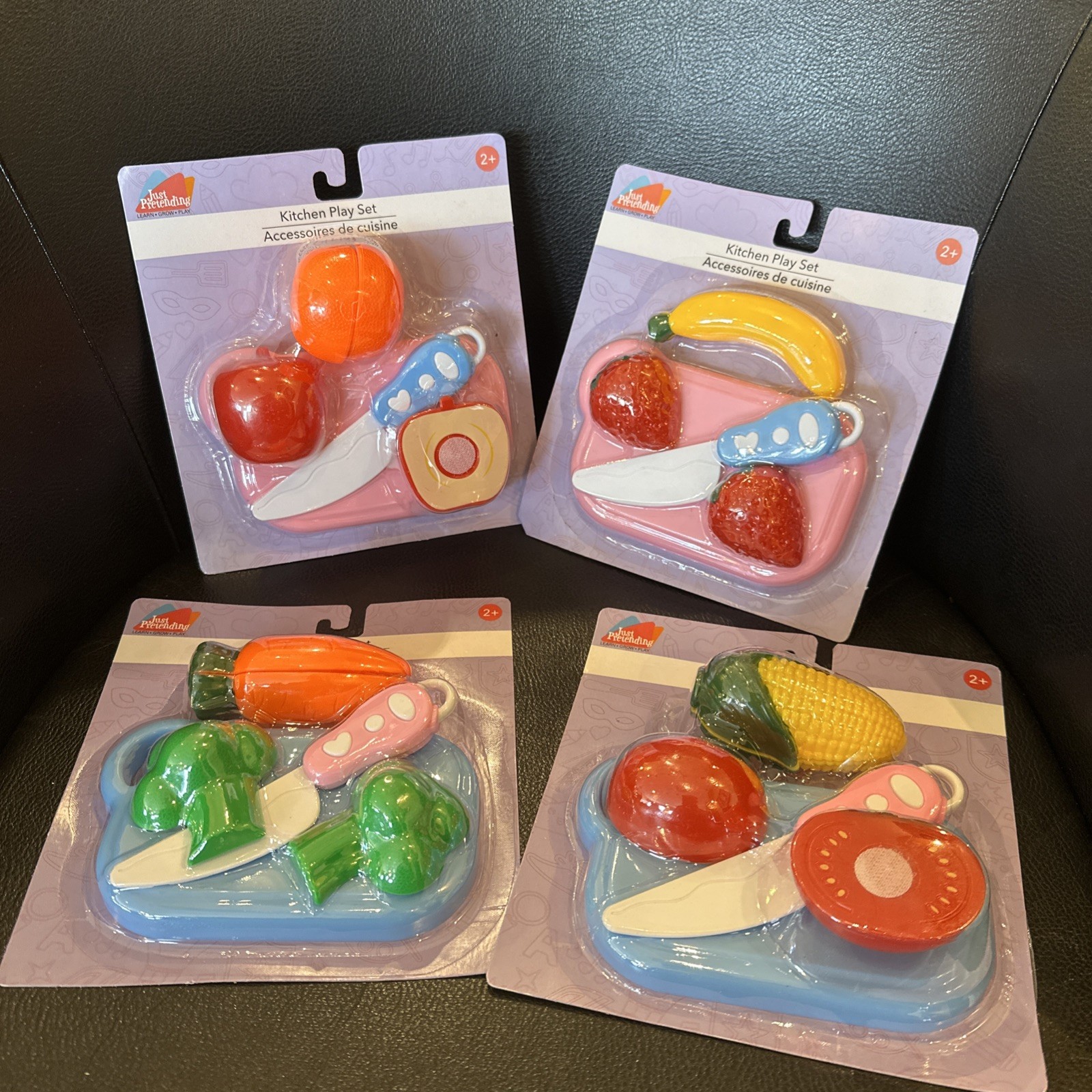 Lot Of 4 Set of Plastic food, Cutting Board, Knife Just Pretending 2+ Assortment