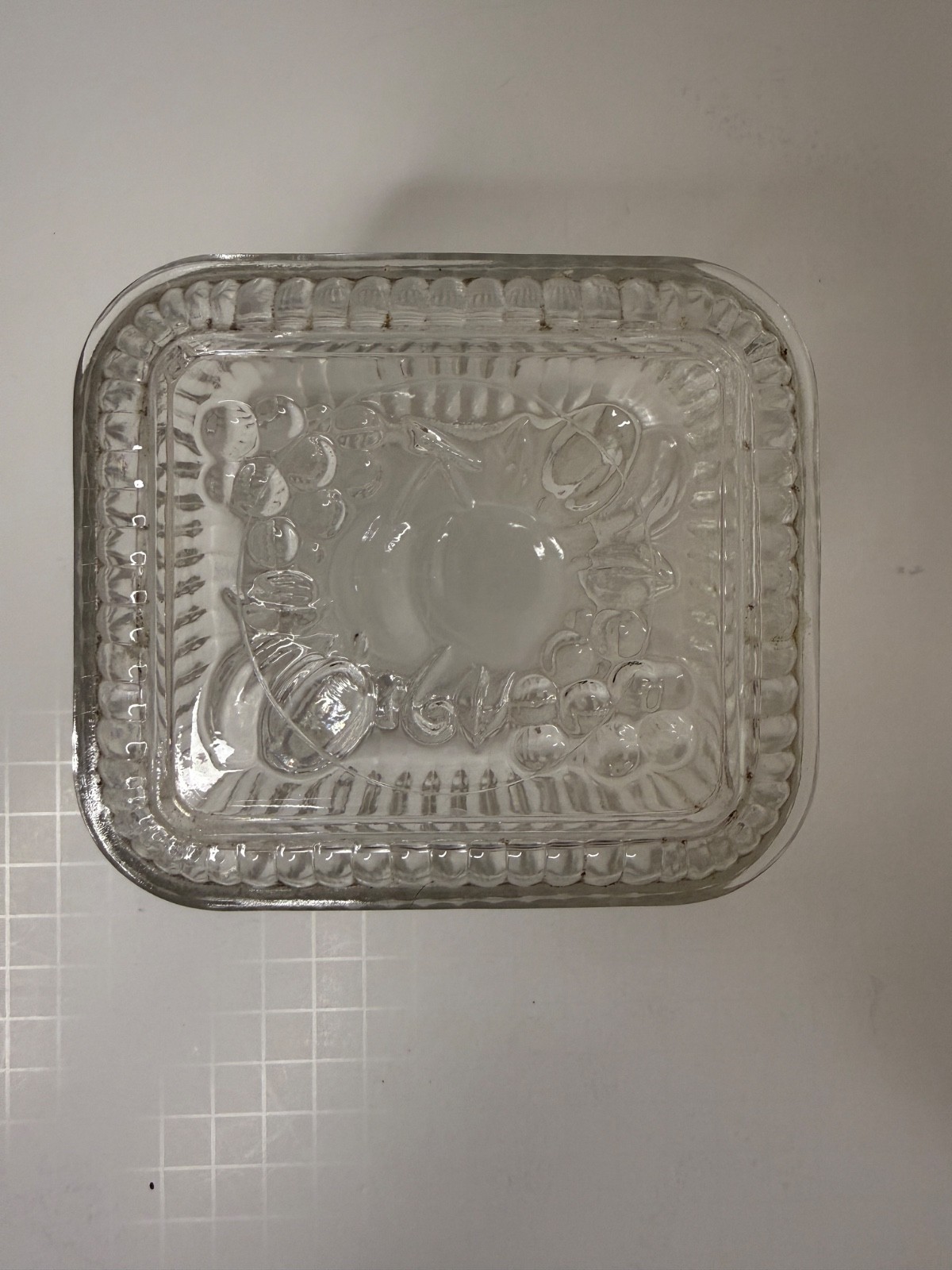 Vintage Federal Glass clear refrigerator dish features an embossed Fruit lid