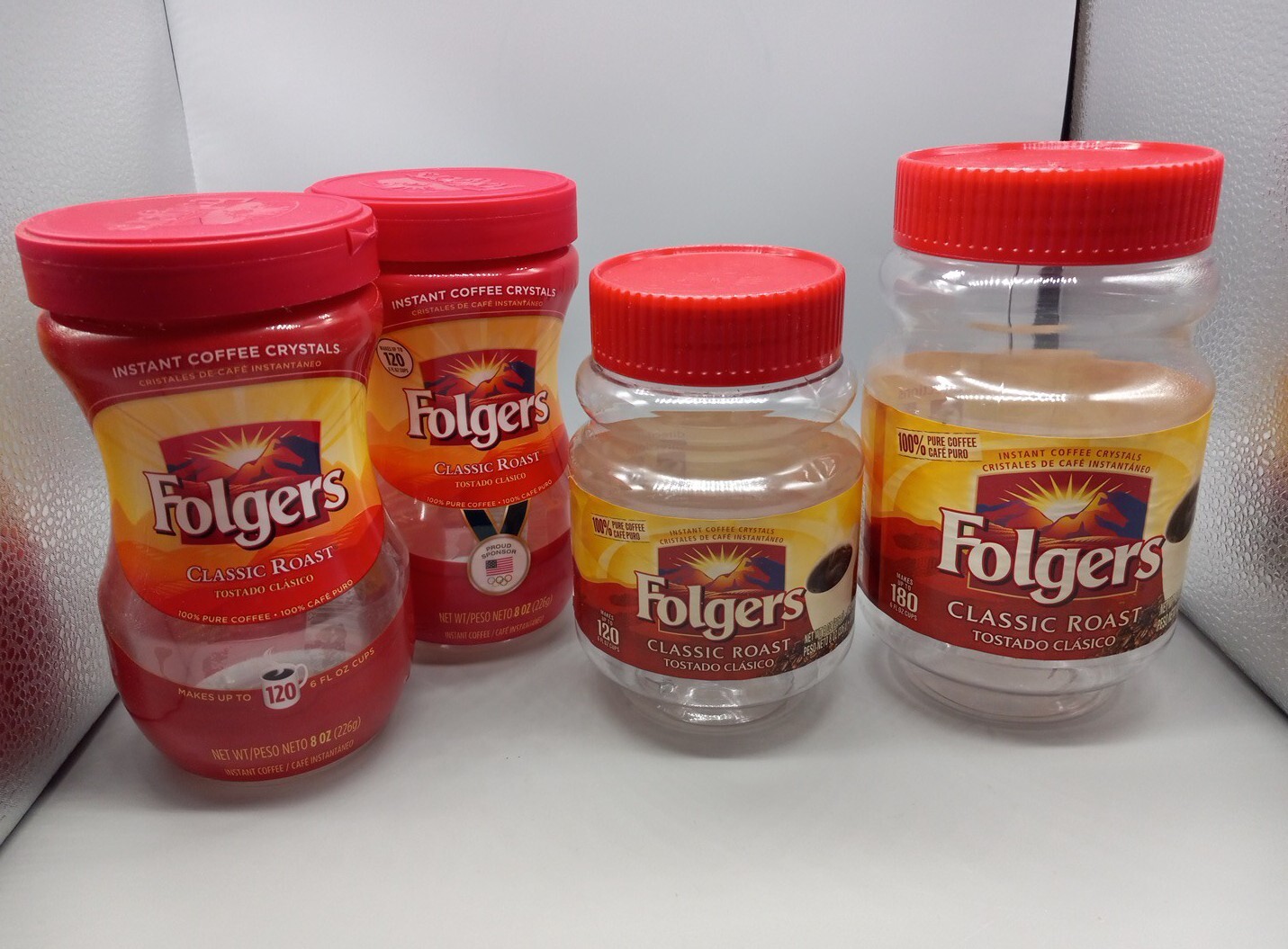Clear plastic, Folgers instant coffee containers. (3 )8oz. and ( 1) 12 oz.