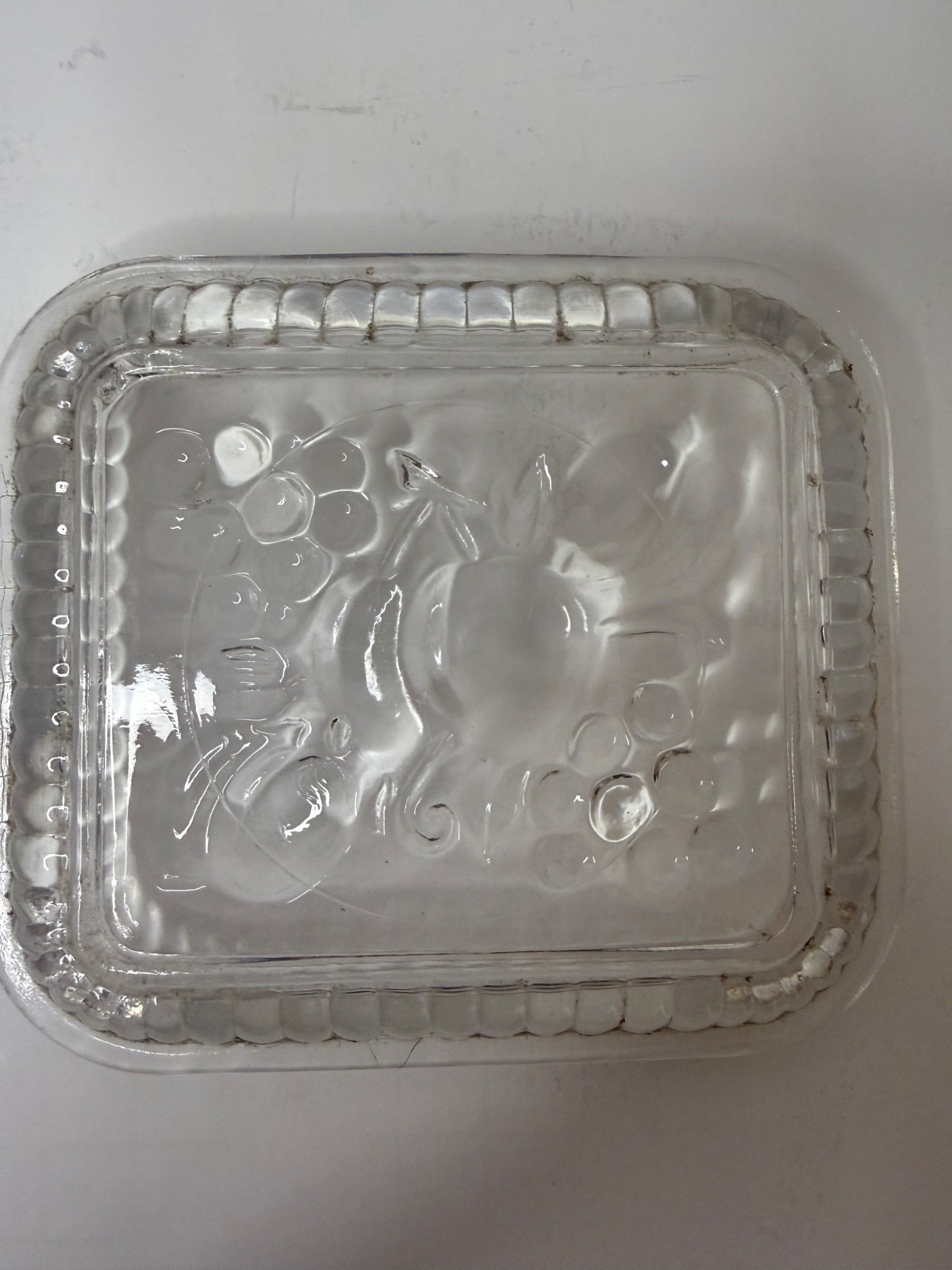 Vintage Federal Glass clear refrigerator dish features an embossed Fruit lid