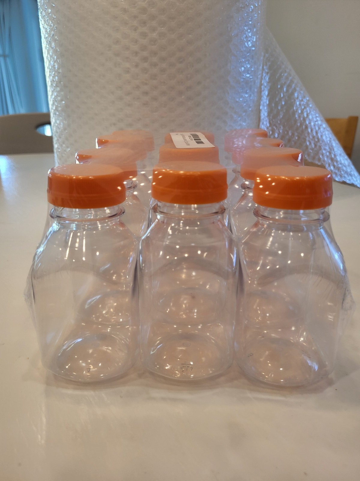 12 Pack Clear Plastic Juice Bottles w/ Orange Caps Food Grade Drink Containers