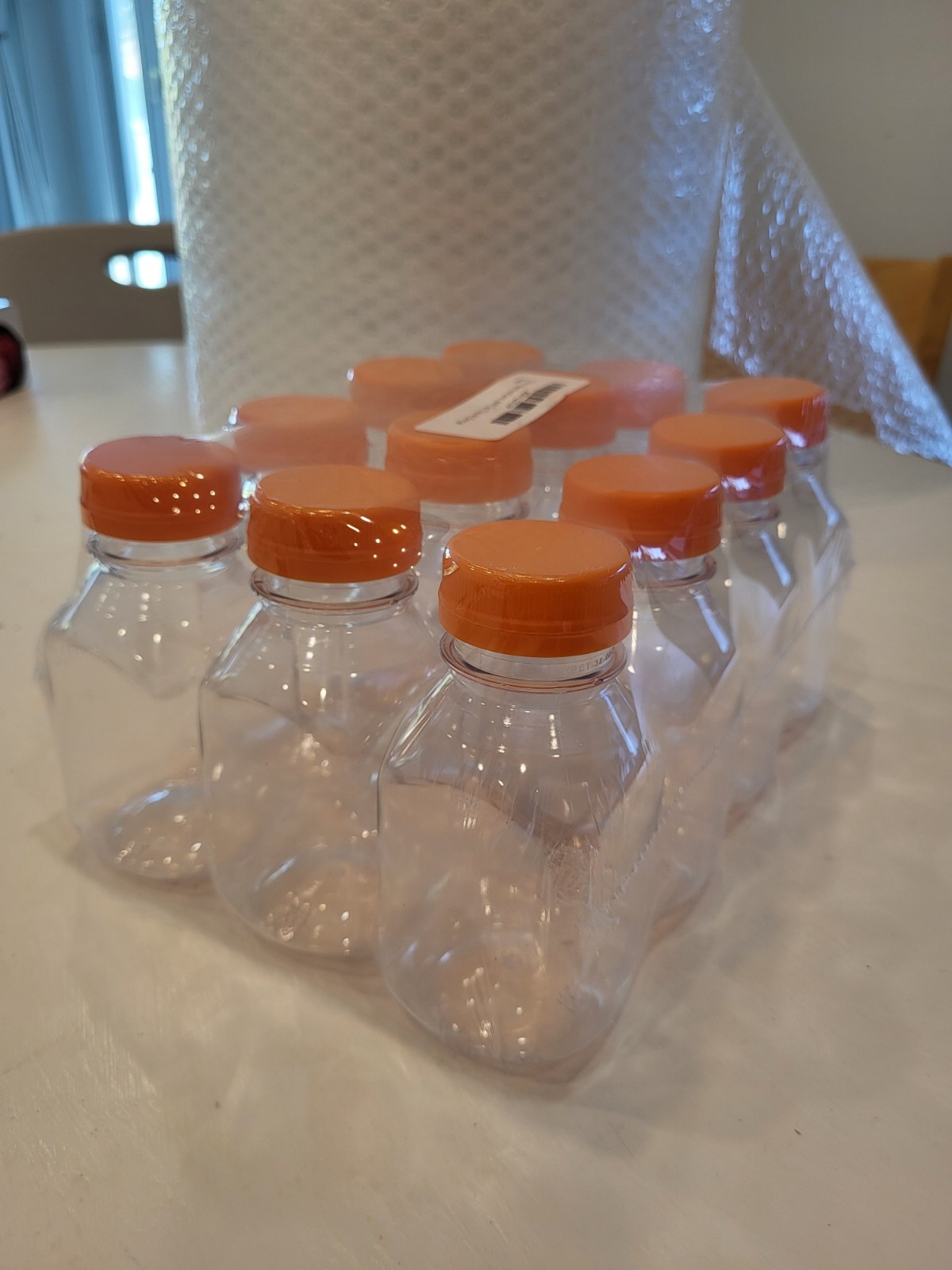 12 Pack Clear Plastic Juice Bottles w/ Orange Caps Food Grade Drink Containers