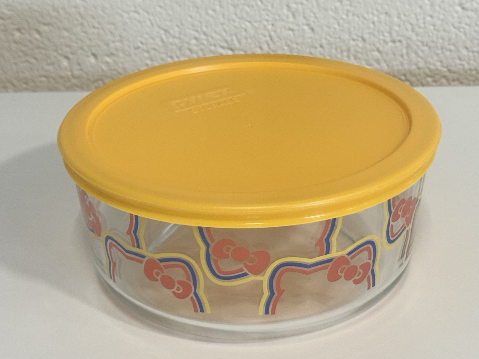 Pyrex HELLO KITTY 7 Cup Glass Storage Set Rainbow Hair Ribbons Red Blue Yellow
