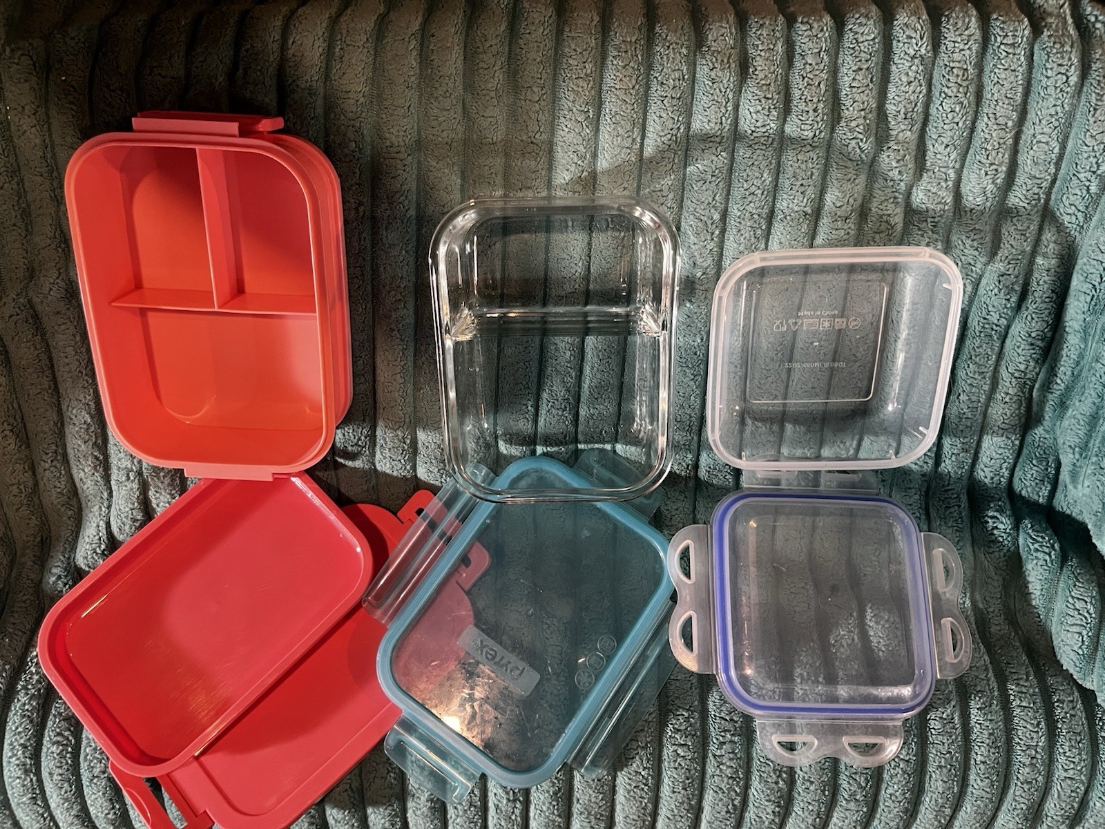 Three separate pieces￼of storage wear￼ one piece is glass and Pyrex. The other t