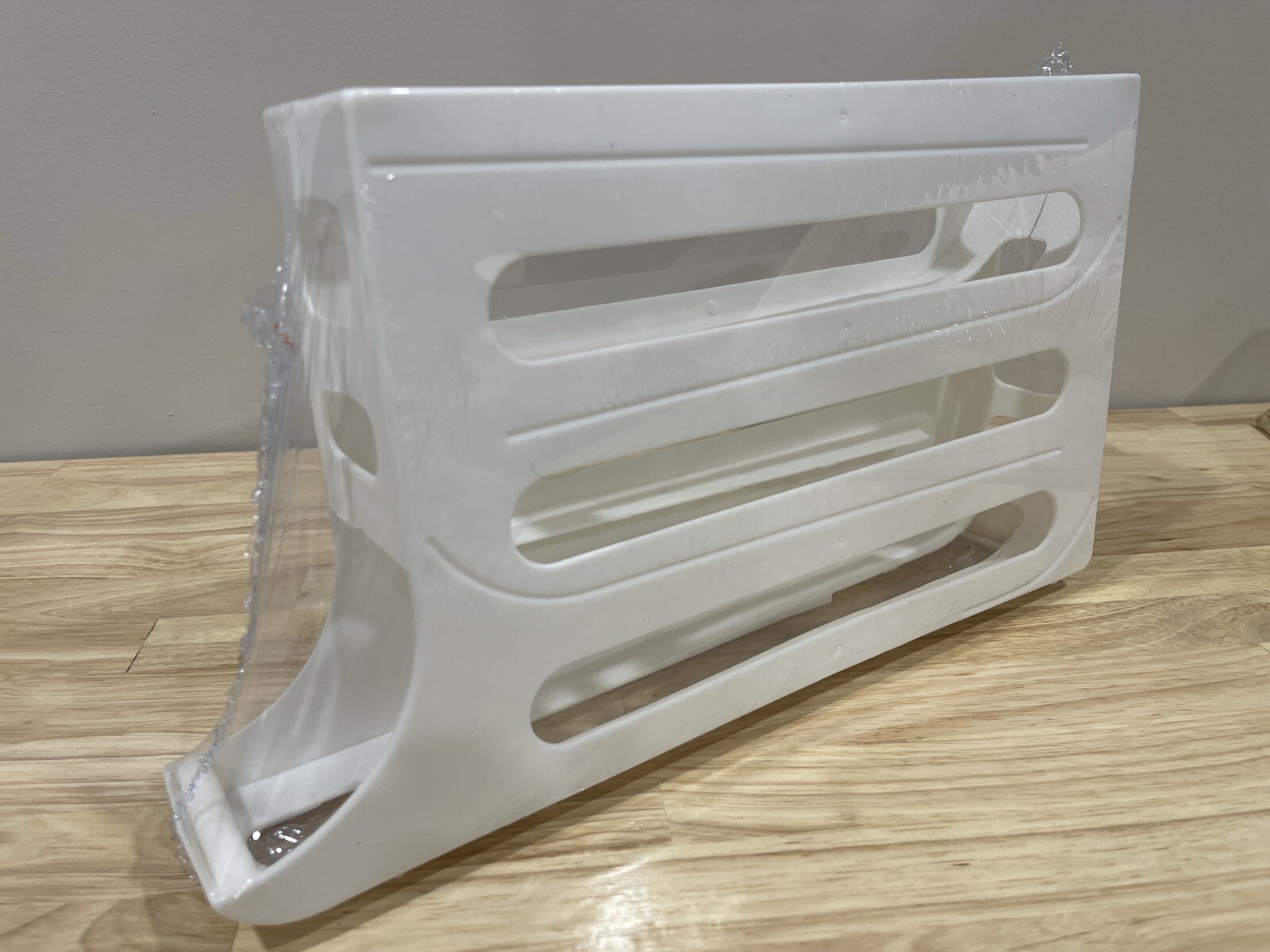 Kitchen Roll down Egg Dispenser & Storage For Refrigerator Organizer Rack Holder