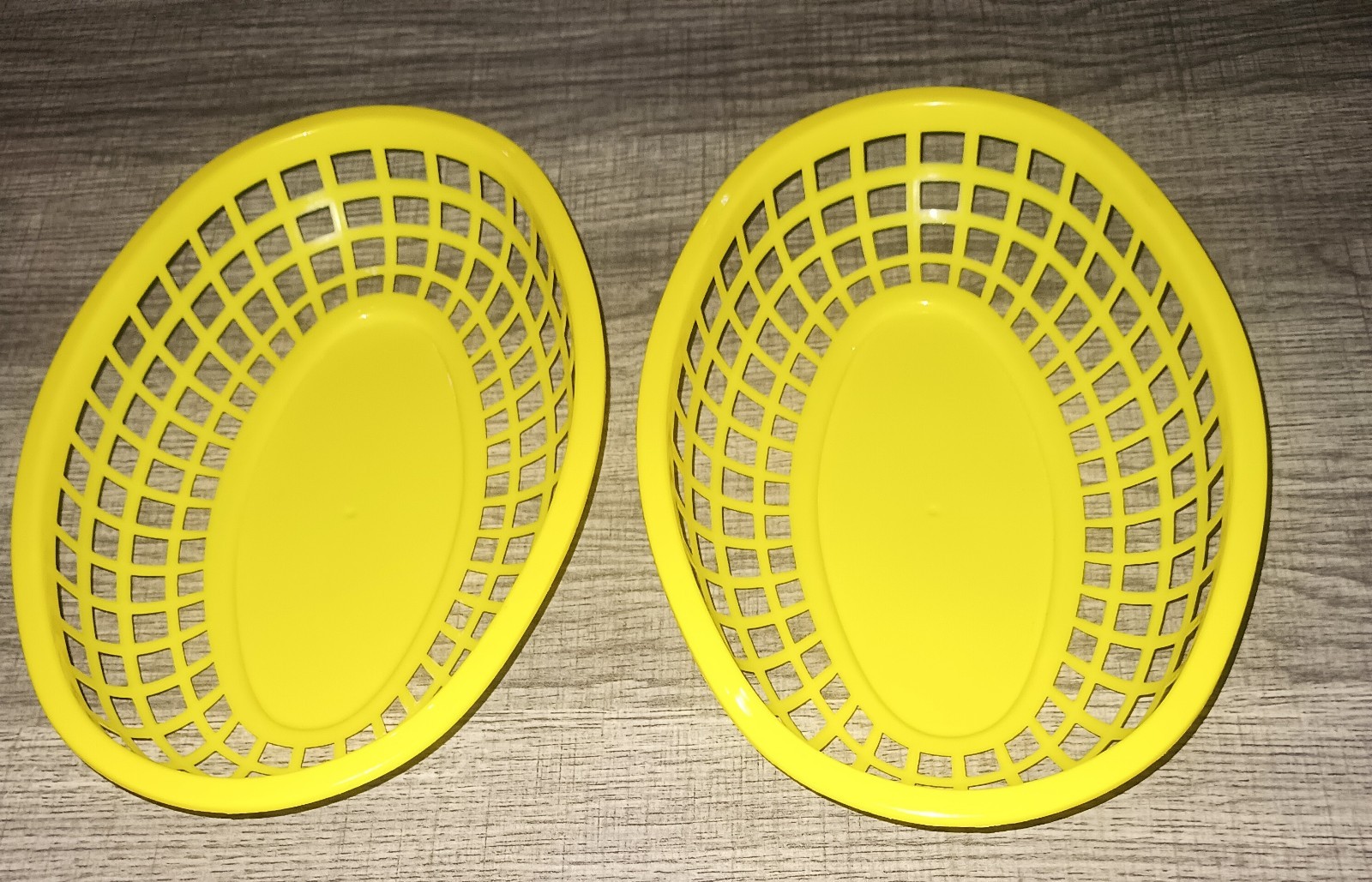 Lot of 2 vintage hard plastic yellow food baskets