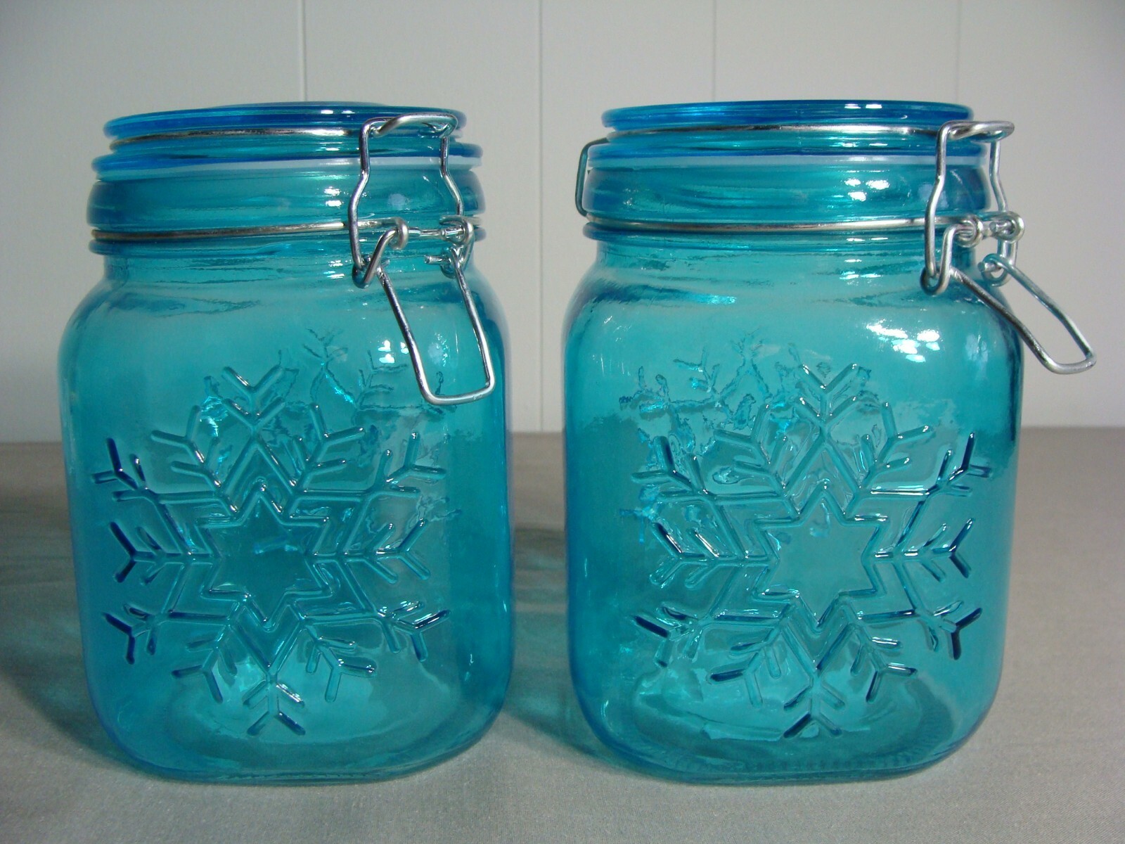 2 Aqua Blue Colored 34 Oz Glass Sealed Storage Jars With Snowflake Design