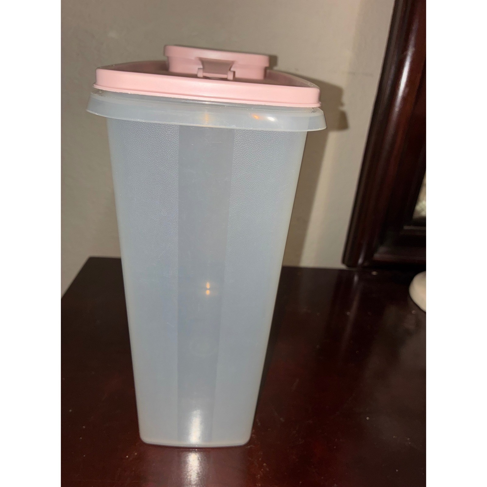 VTG Tupperware #1588-8 Pink Cereal Keeper-Red Lid. 9.5″h x 9″l x 4″w.