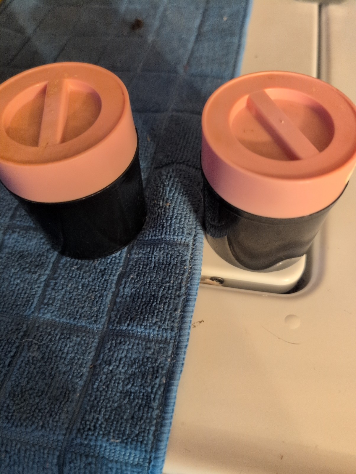 Set Of 2 Black With Pink Lid Containers Height 3 Diameter 2