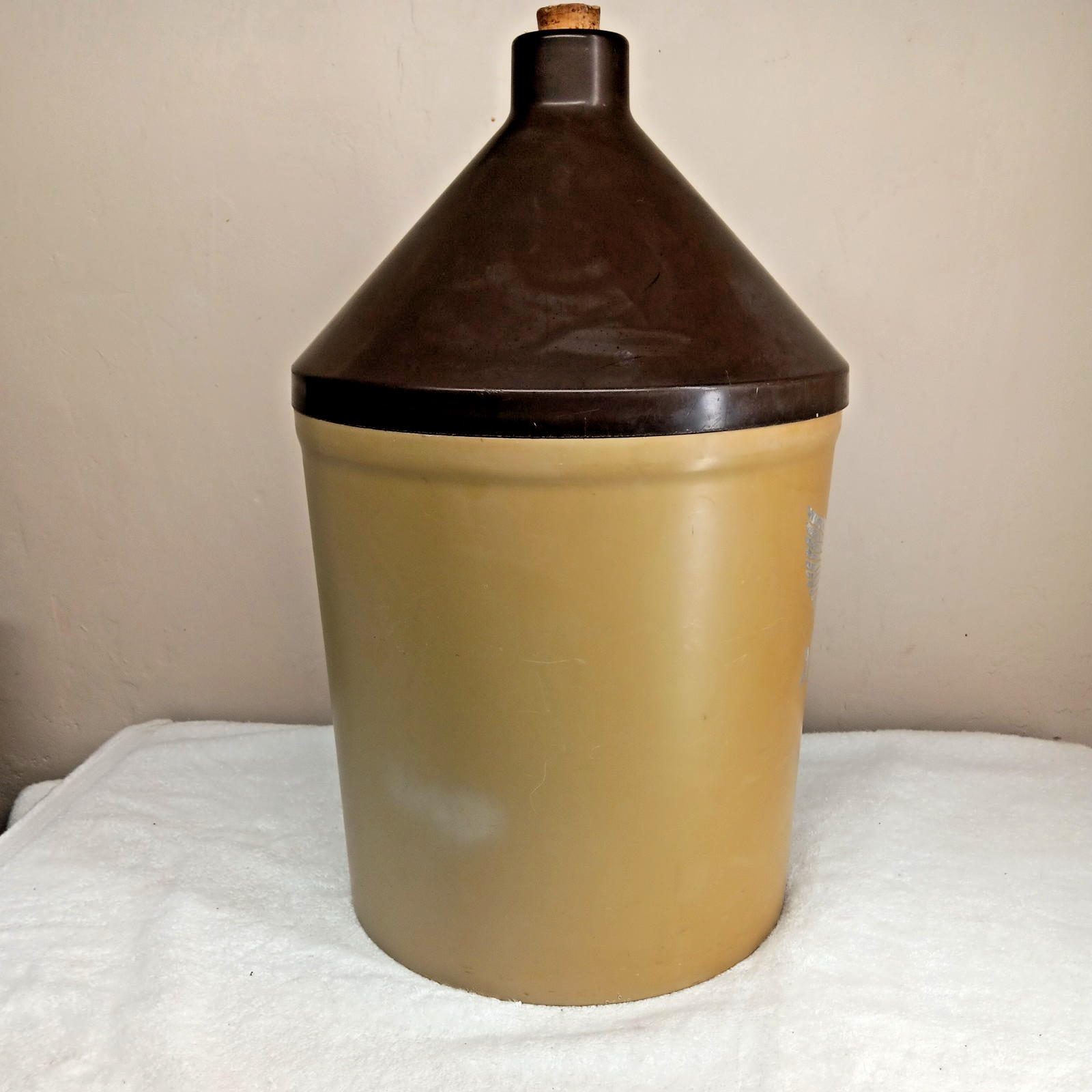 very large plastic “little brown jug”storage container American emblem on front