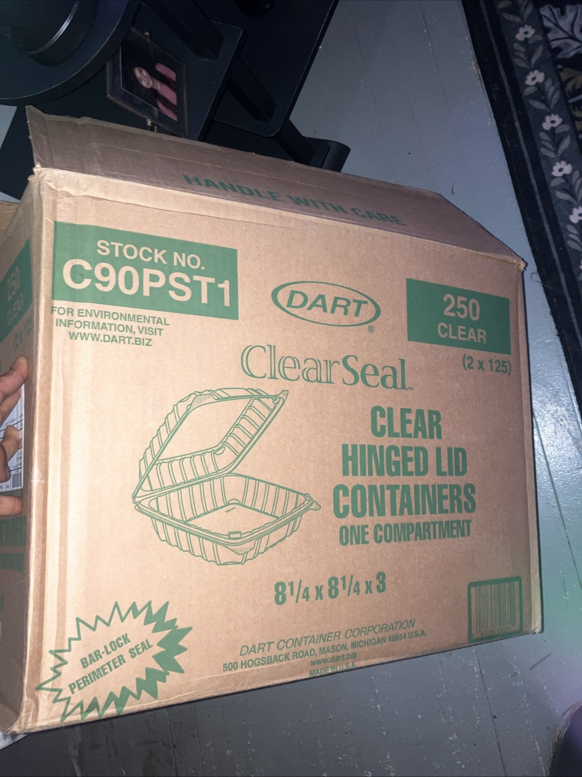 250 Dart ClearSeal hinged-lid plastic containers, which measure