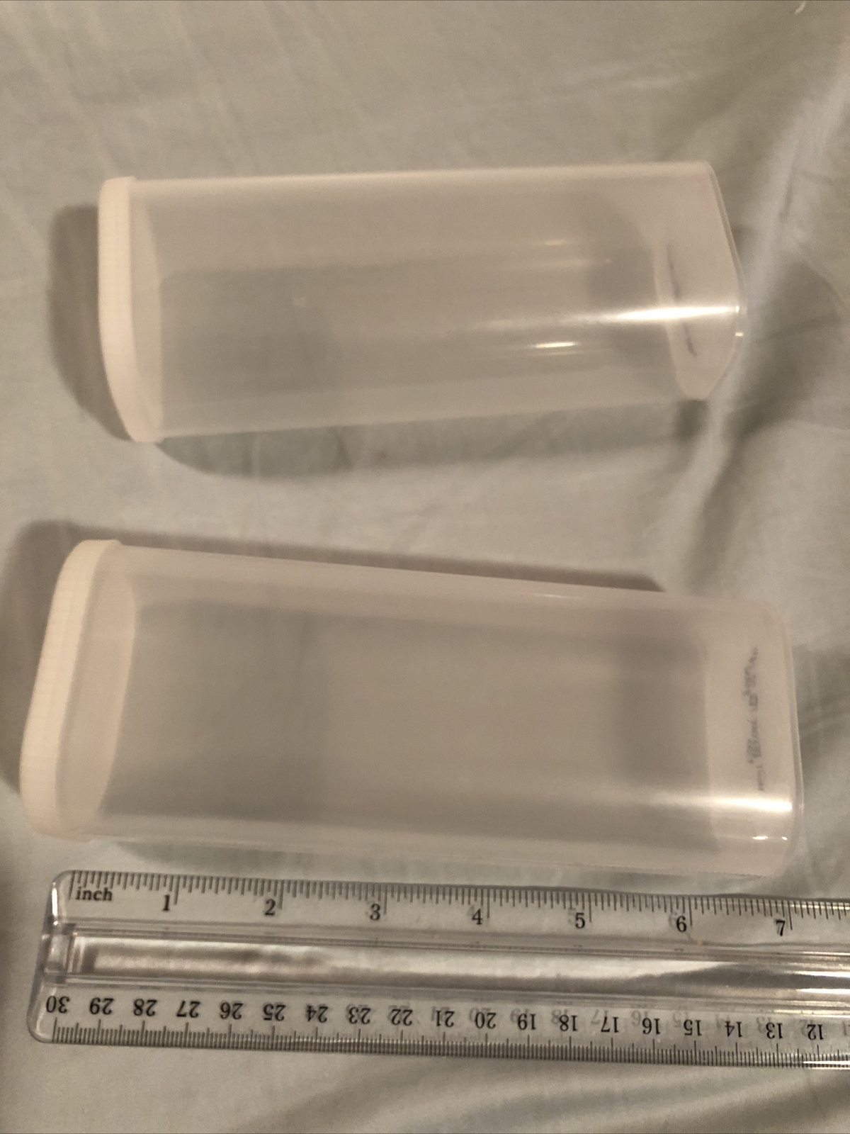 2 Plastic Canisters, Snap On Lids, Rounded Rectangle Shape, about 6.5” long